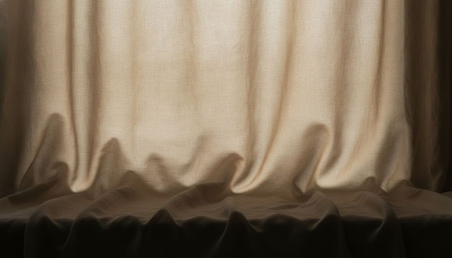Close-up of draped mulberry silk fabric in warm natural light